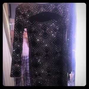 Long sleeve sparkly black mini dress. Brand new
